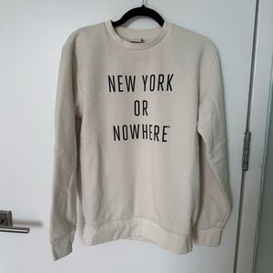 NYON Cream Sweatshirt with black logo words. Women’s Small
